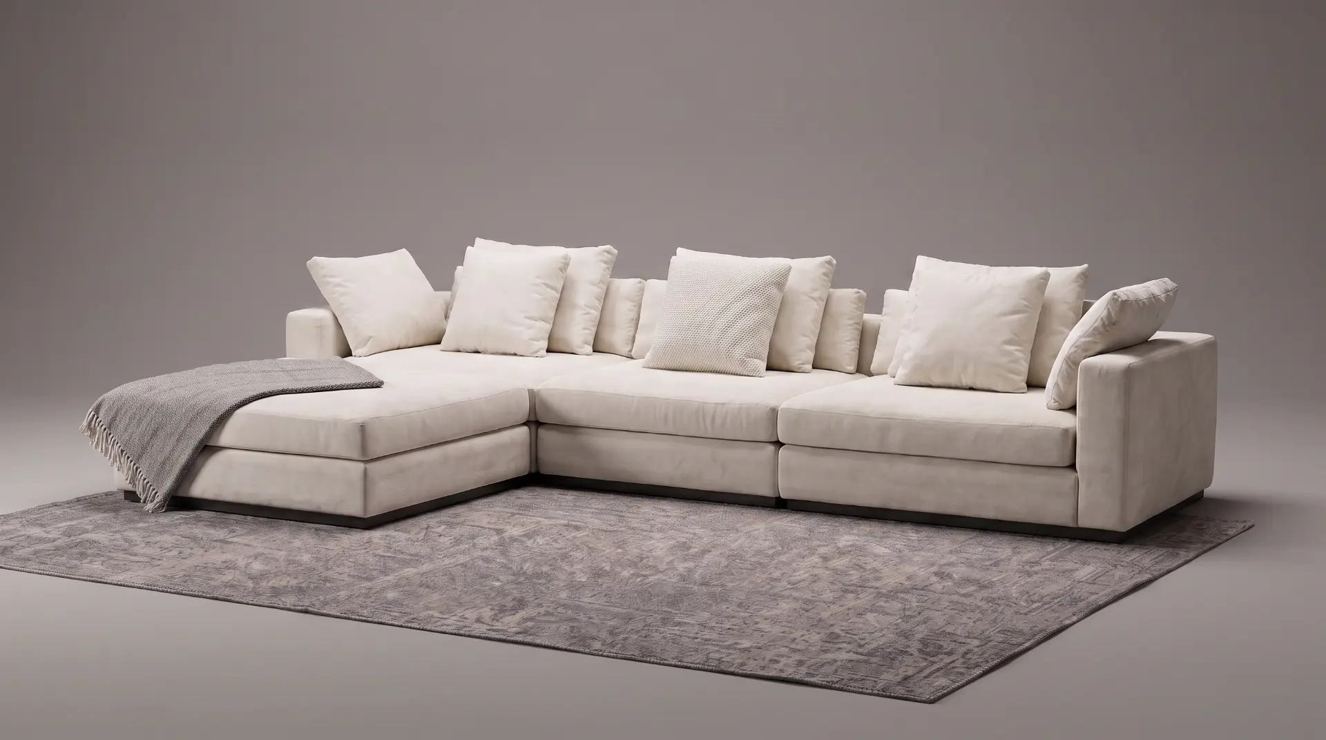 Emilia seccional con chaise longue y manta gris